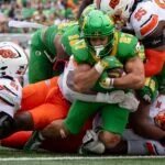 Big Ten Paradigm: Michigan Stunned, Oregon Dominates Week 2