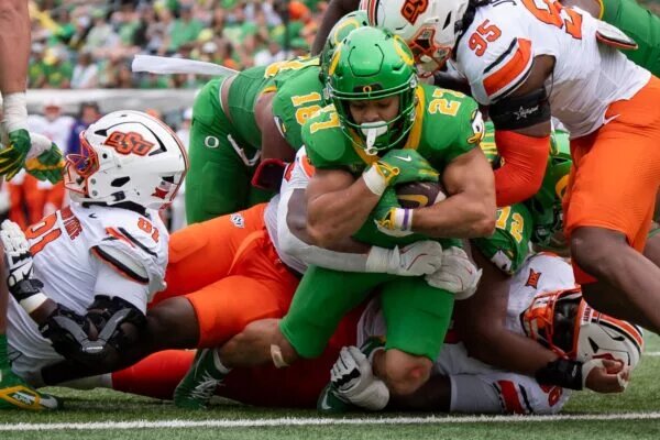 Big Ten Paradigm: Michigan Stunned, Oregon Dominates Week 2