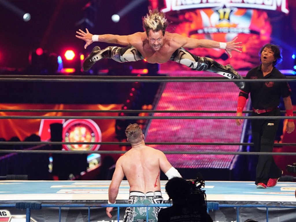 AEW Rampage spoilers - Image of Kenny Omega diving on to Will Ospreay