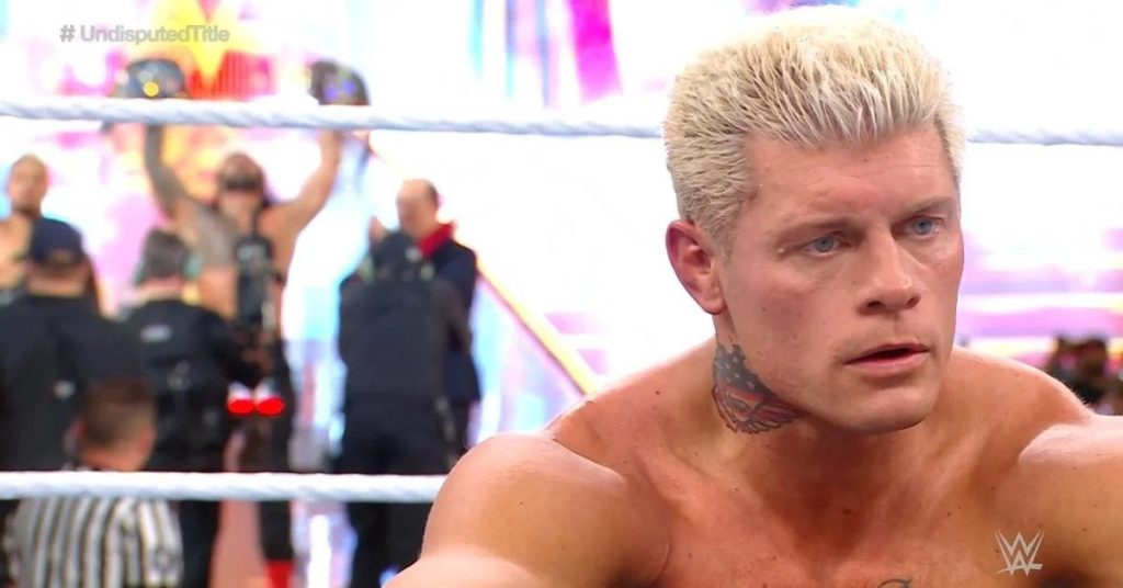 Cody Rhodes sits in ring after upset loss to Roman Reigns at WrestleMania 39 in Los Angeles, CA
