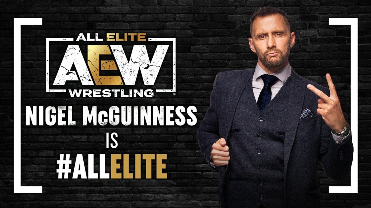Nigel McGuinness with the All Elite Wrestling logo next to him