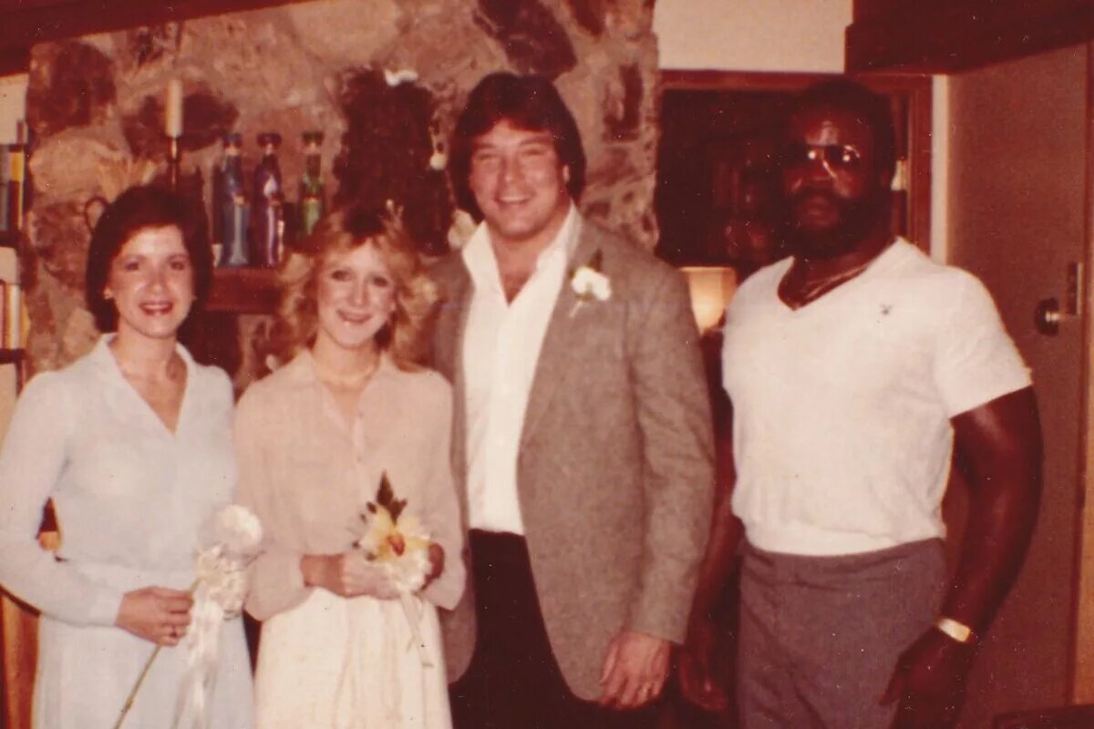 A photo of The Junkyard Dog with a Young Ted DiBiase on Dark Side of the Ring.