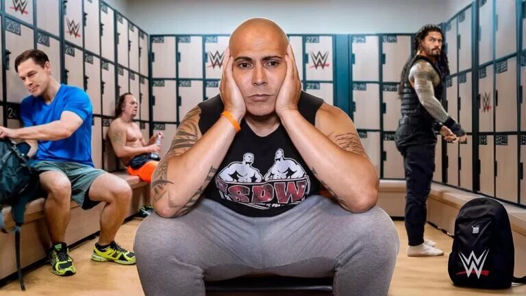 Maven Huffman seated in a WWE locker room