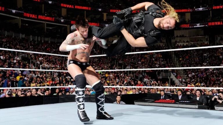 CM Punk battling Seth Rollins at 2014 WWE Royal Rumble event.
