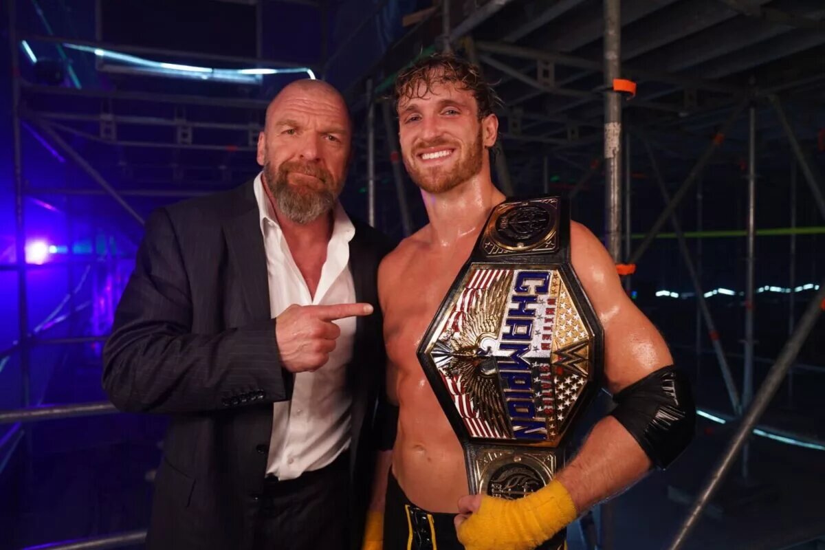 New WWE U.S. Champion Logan Paul with Triple H.