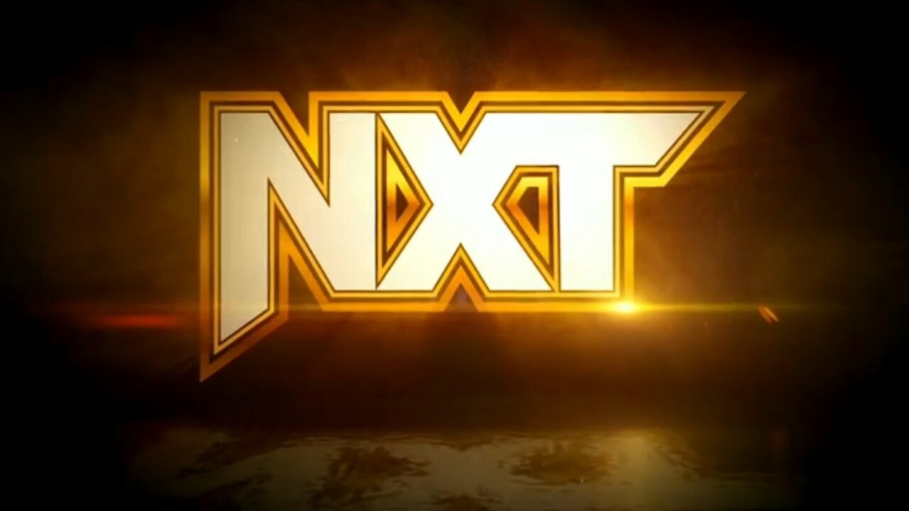 A photo of WWE NXT logo.