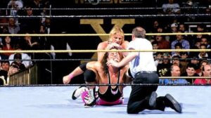 A photo of Bret Hart and Owen Hart in the opening match of WWE WrestleMania X.