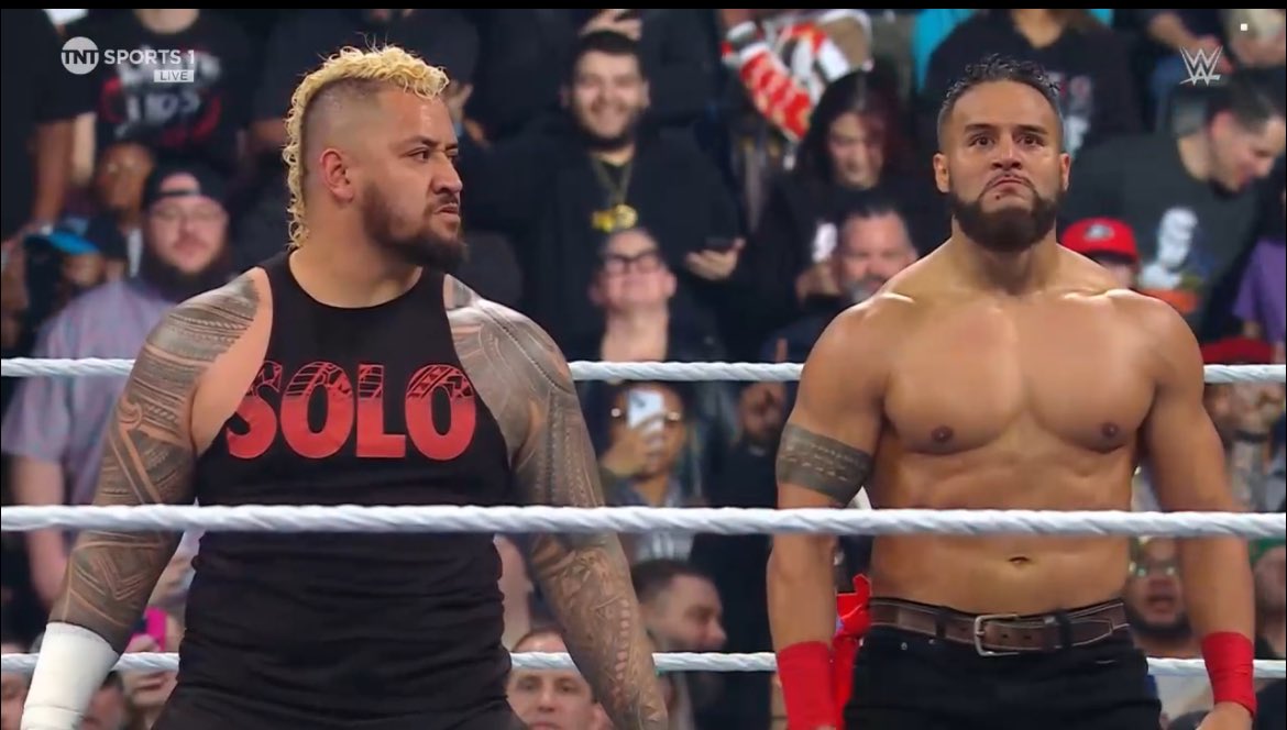 A photo of Tama Tonga in his WWE debut alongside The Bloodline member Solo Sikoa.