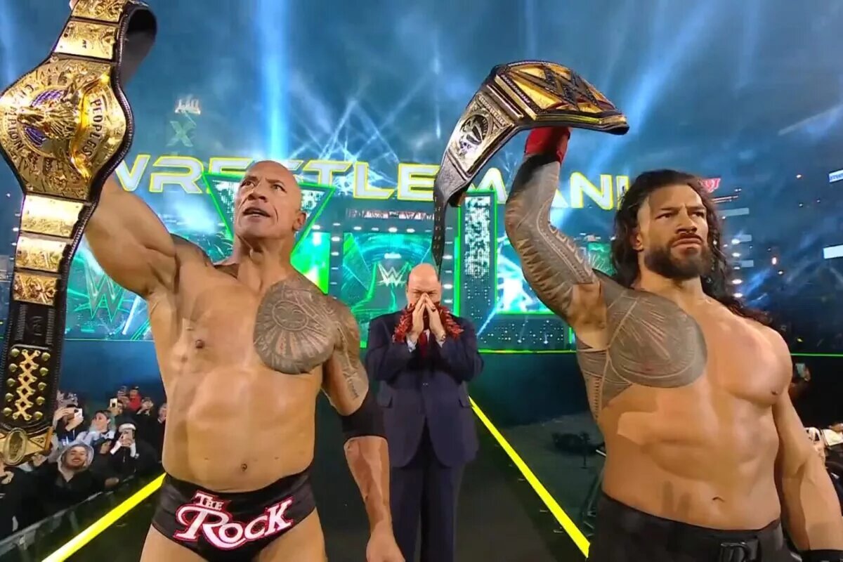 A photo of The Rock and Roman Reigns at WWE WrestleMania 40.