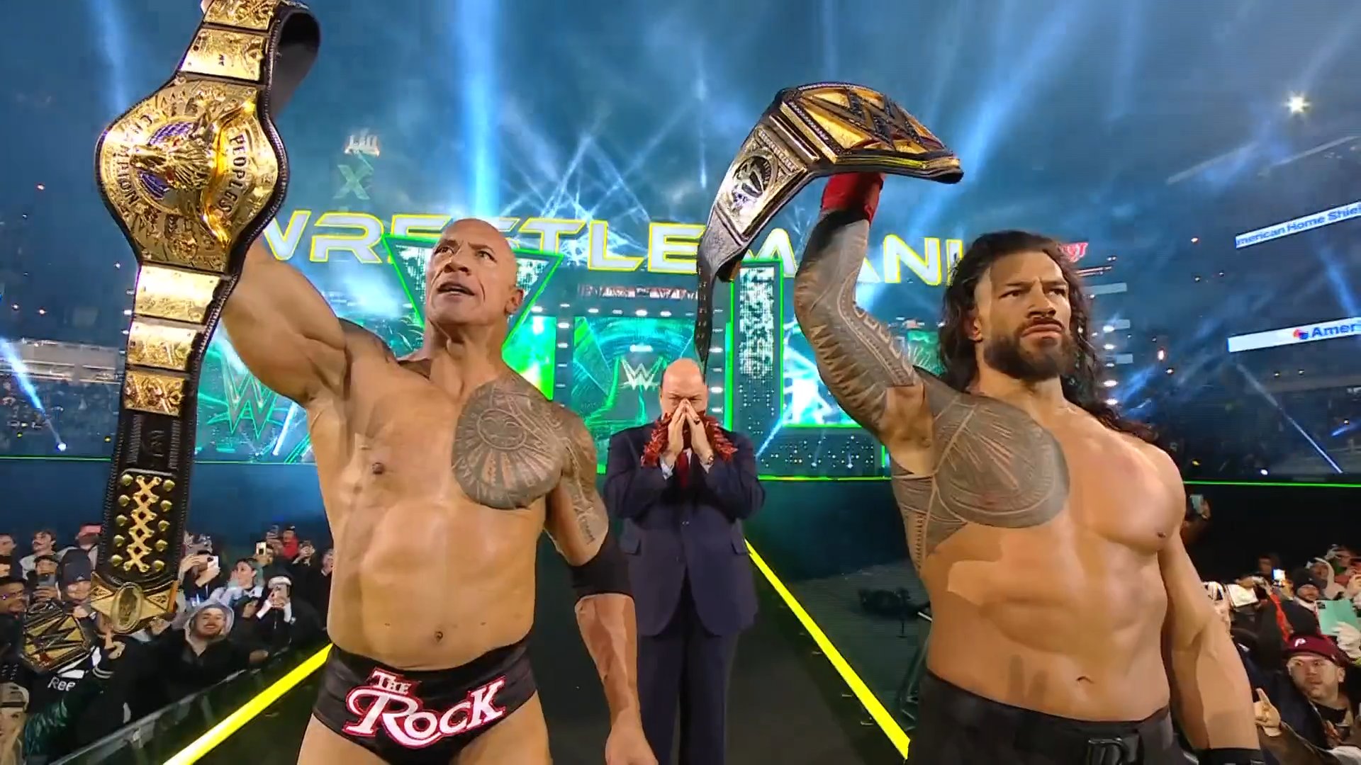 A photo of The Rock and Roman Reigns at WWE WrestleMania 40.