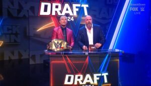 A photo of WWE CCO Triple H and Undisputed WWE Champion Cody Rhodes.