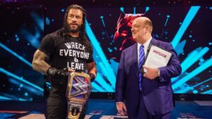 A photo of WWE megastar Roman Reigns with Paul Heyman.