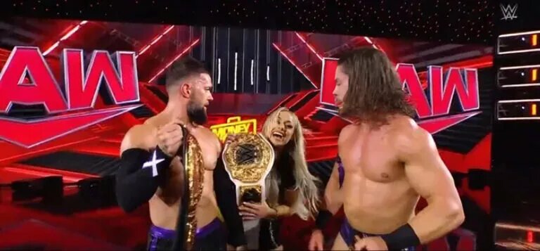 Liv Morgan celebrating with The Judgement Day including JD McDonagh