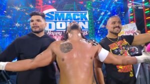 A photo of Angel Garza with Legado Del Fantasma on WWE SmackDown.