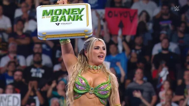 Tiffany Stratton holds the Women's Money in the Bank briefcase