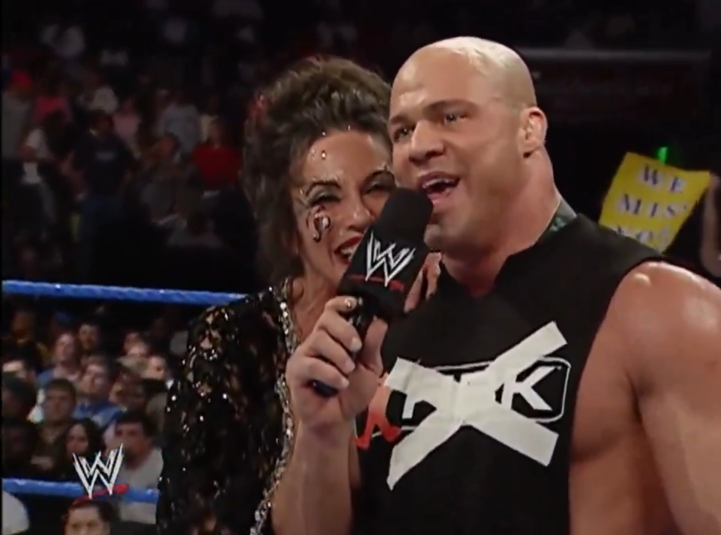 A photo of Kurt Angle with Sensational Sherri, one of the best WWE Golden Era managers of all-time, on WWE SmackDown.