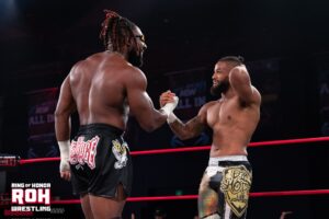 A photo of AEW/Ring of Honor (ROH) star EJ Nduka, with his partner Lee Johnson.