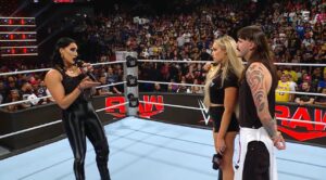 A photo from WWE Raw featuring Rhea Ripley and Liv Morgan, who'll meet at WWE Blood, along with Dominik Mysterio.