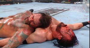 A match graphic from WWE Bad Blood during the CM Punk and Drew McIntyre "Hell in a Cell" Match.