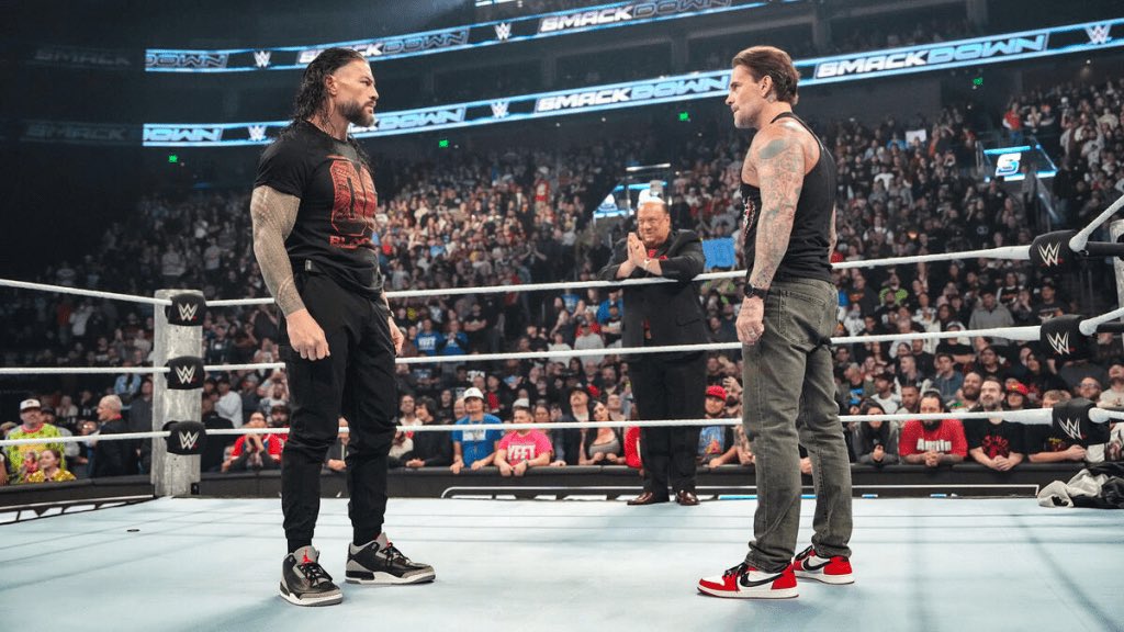 Blog banner image for WWE SmackDown results and analysis for April 4th, 2025 featuring CM Punk and Roman Reigns.