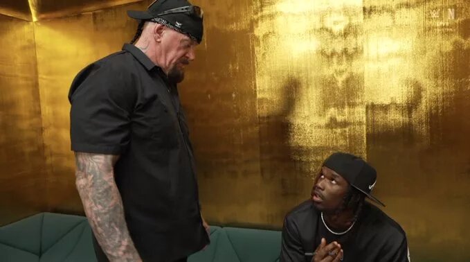 WWE NXT picture of Je'Von Evans with The Undertaker