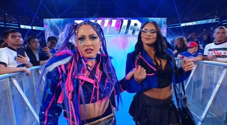 A photo of WWE superstar Kiana James and Giulia.