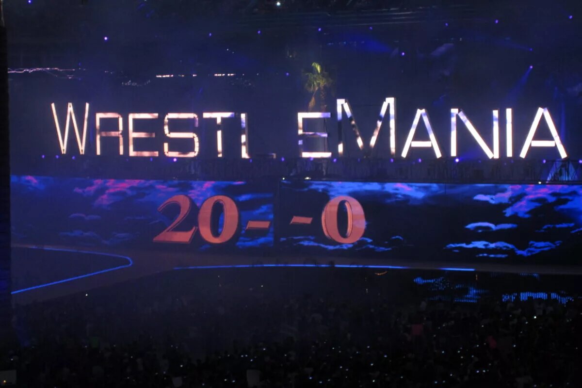 A photo of WWE star The Undertaker and his streak at WrestleMania.