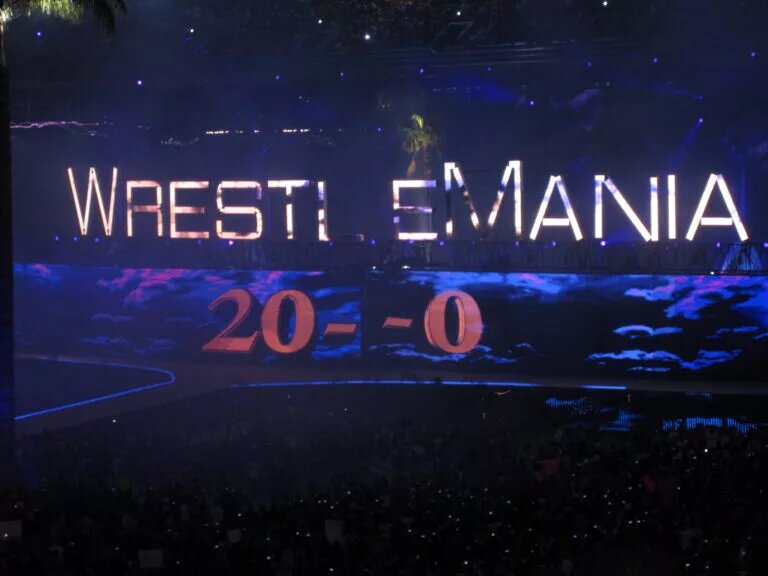A photo of WWE star The Undertaker and his streak at WrestleMania.