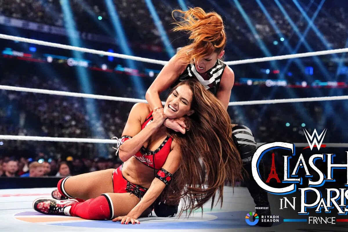 Clash in Paris image of Becky Lynch and Nikki Bella