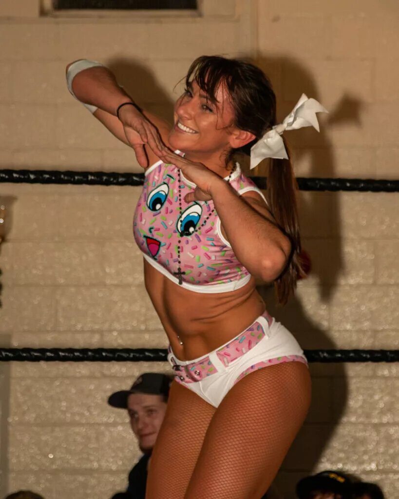 A graphic of WWE ID champion Kylie Rae.