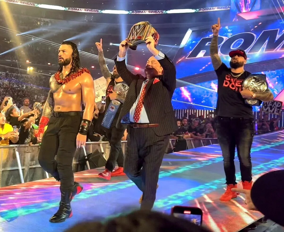 A photo of The Usos, with The Bloodline.