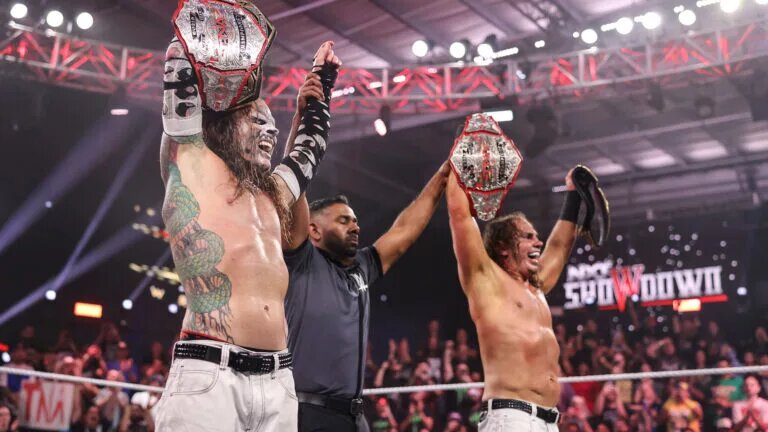 image of The Hardy Boyz at WWE NXT Showdown winning the TNA and NXT Tag Team Championships