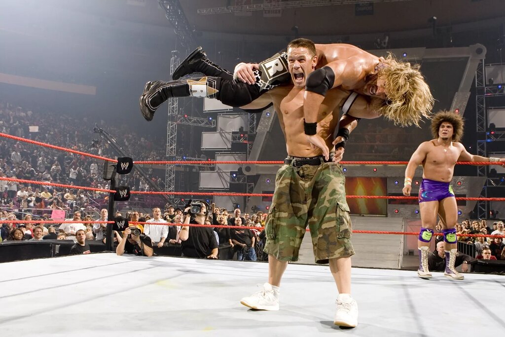 A photo of John Cena and one of his best WWE Rivals, Edge.