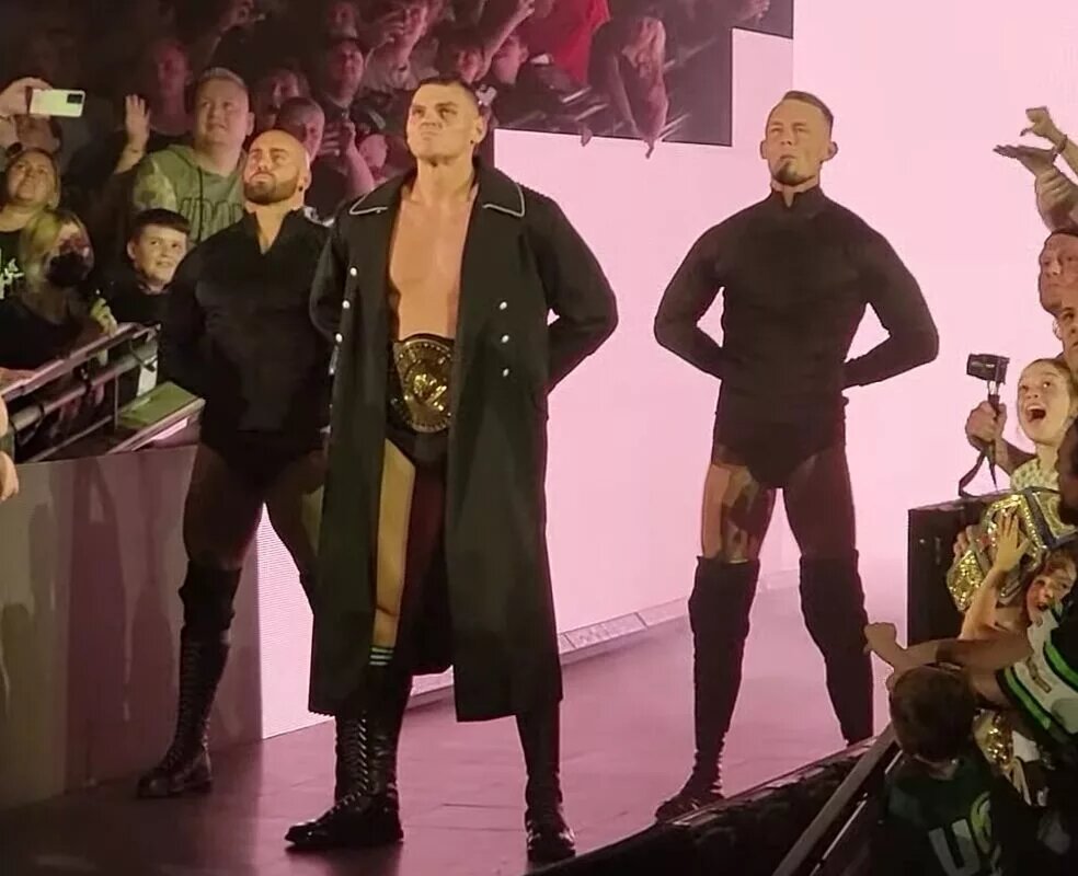 A photo of WWE star Gunther with Imperium.