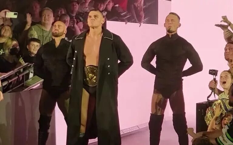 A photo of WWE star Gunther with Imperium.