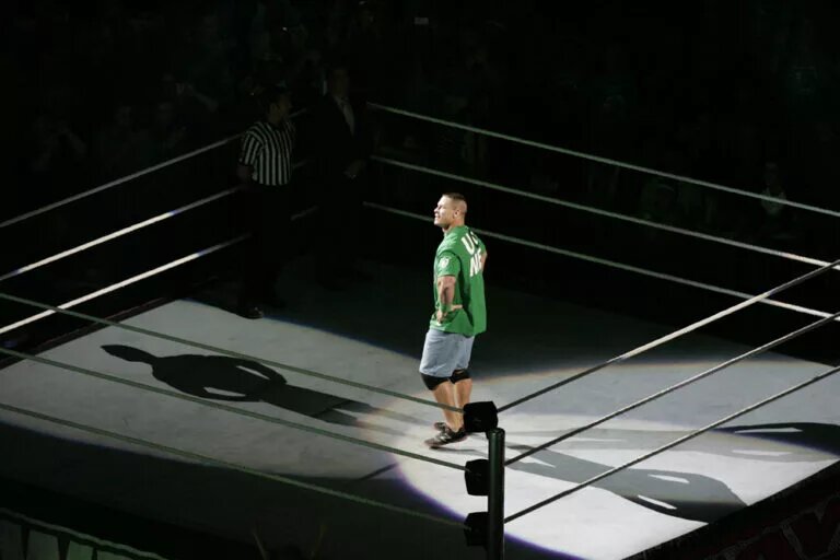 A photo of WWE legend, John Cena, who's had 17 WWE world title reigns.
