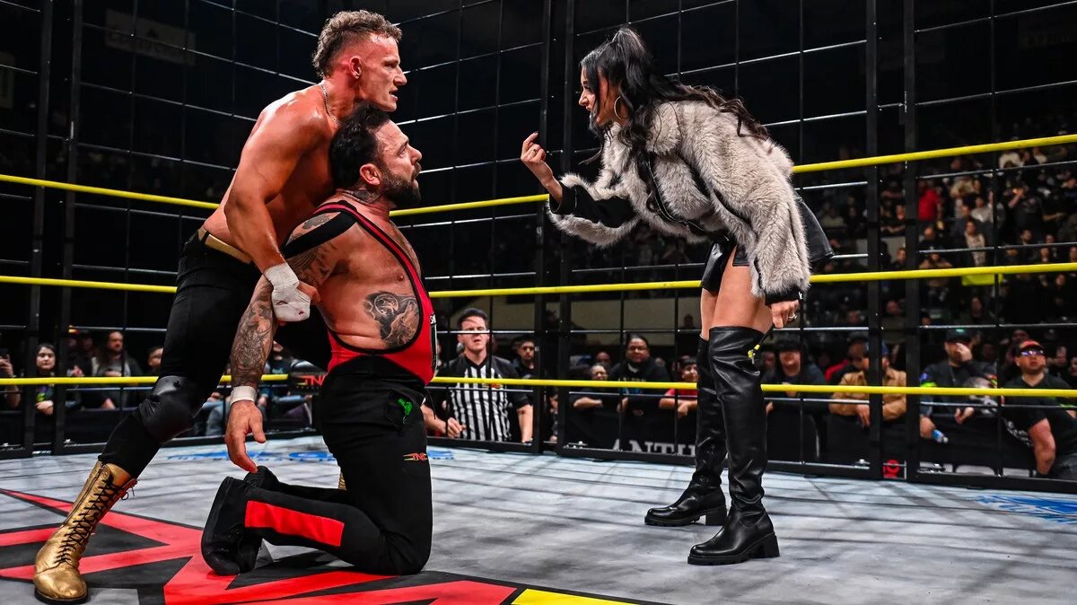 A graphic of TNA iMPACT December 18, 2025 episode. Team TNA defeated team NXT in a Steel Cage match, but Santino Marella was betrayed by his daughter Arianna Grace and Channing "Stacks" Lorenzo