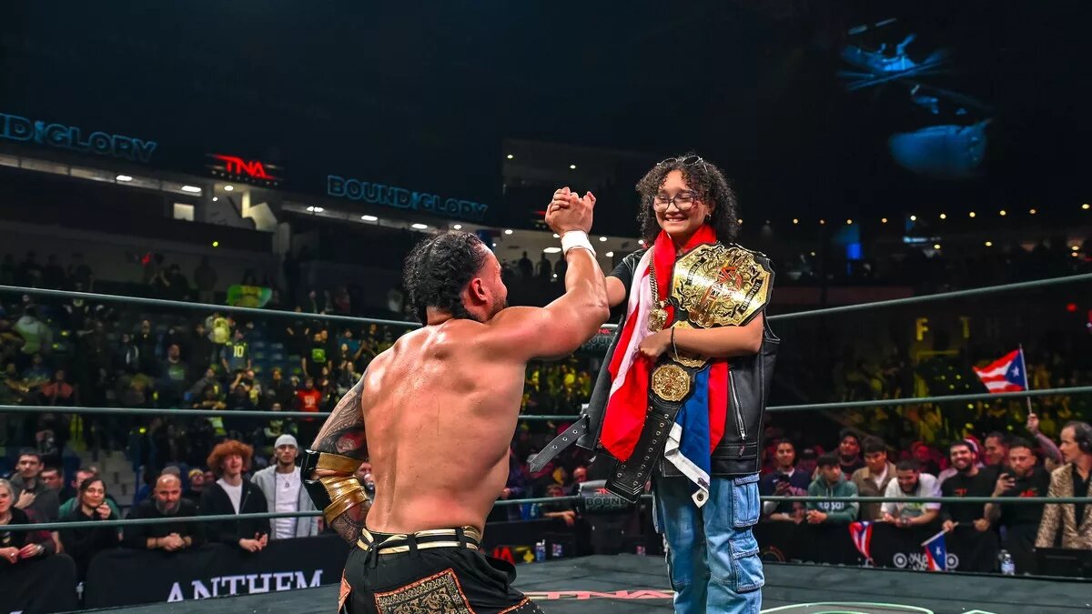 Mike Santana and his daughter Ariana as he just won the TNA World Championship at TNA Bound For Glory 2025