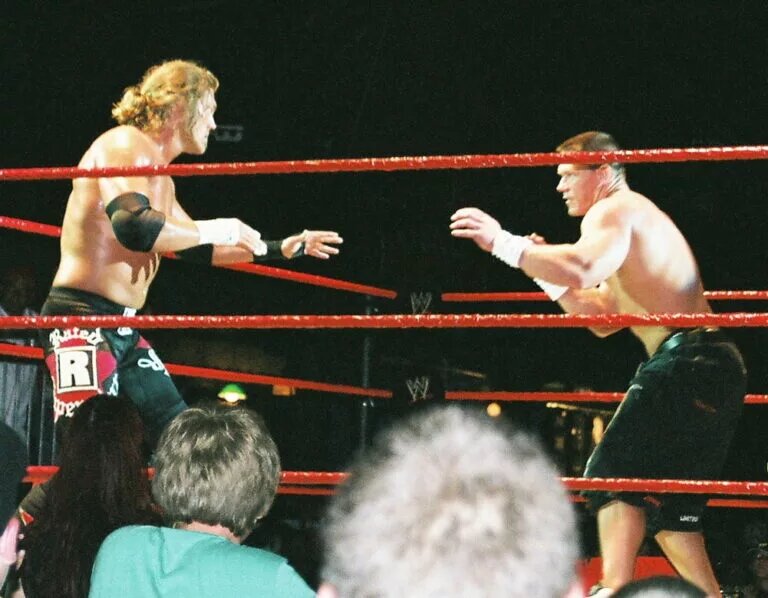 A photo featuring John Cena and Edge, who exchanged WWE Title reigns.