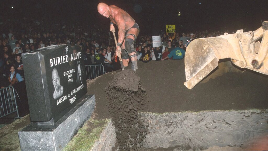 A graphic of The Buried Alive match between Stone Cold Steve Austin and The Undertaker at RIck Bottom 1998