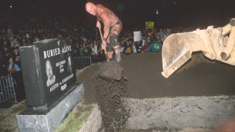 A graphic of The Buried Alive match between Stone Cold Steve Austin and The Undertaker at RIck Bottom 1998