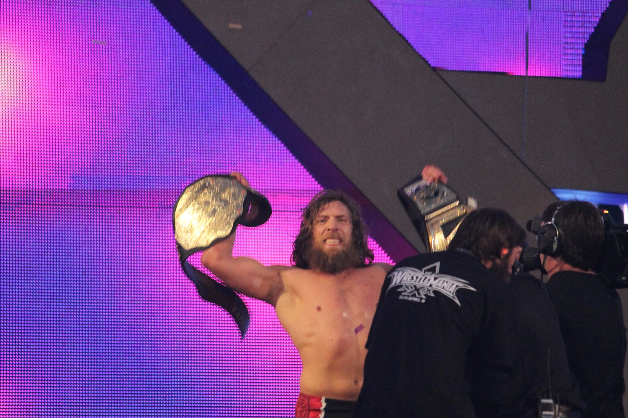 A graphic of Daniel Bryan, one of the WWE wrestlers John Cena has elevated.