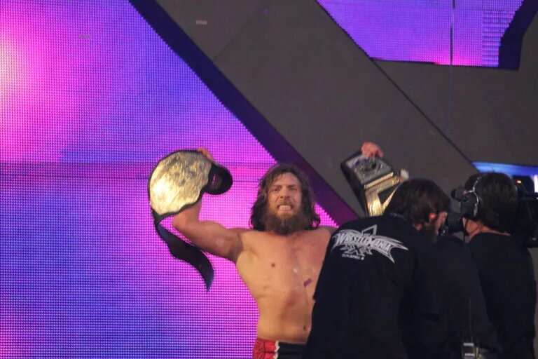 A graphic of Daniel Bryan, one of the WWE wrestlers John Cena has elevated.