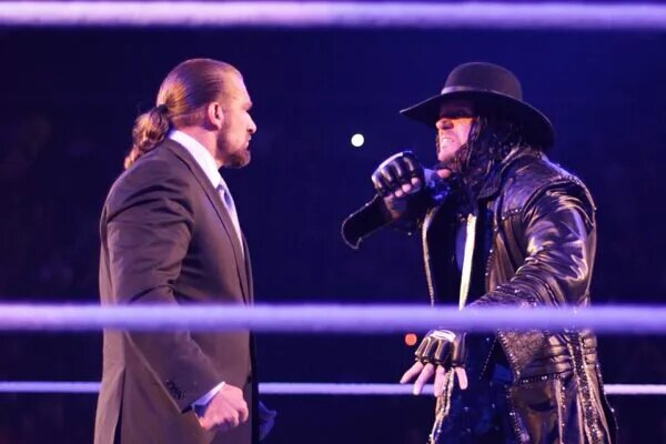 A photo of WWE legends Triple H and The Undertaker, mainstays of the Royal Rumble.