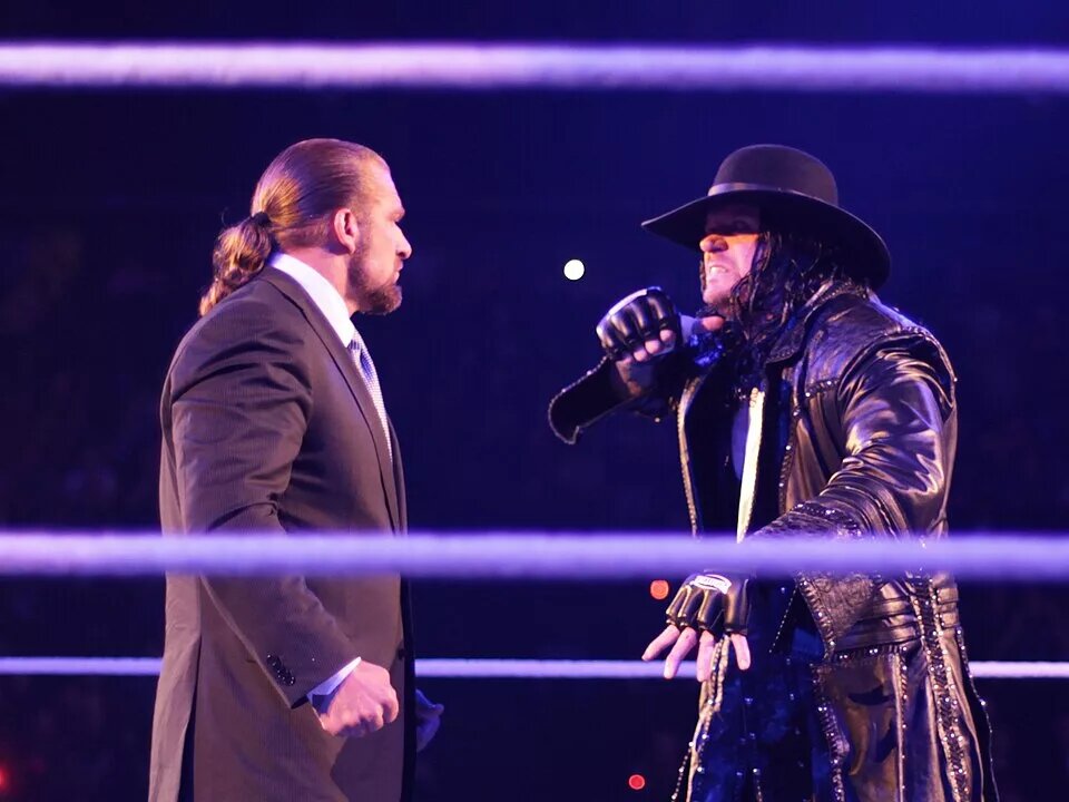 A photo of WWE legends Triple H and The Undertaker, mainstays of the Royal Rumble.