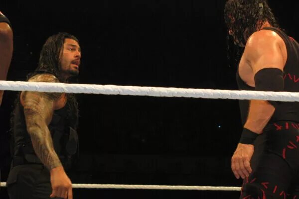 A photo of perennial WWE Royal Rumble runner-up, Kane and Roman Reigns
