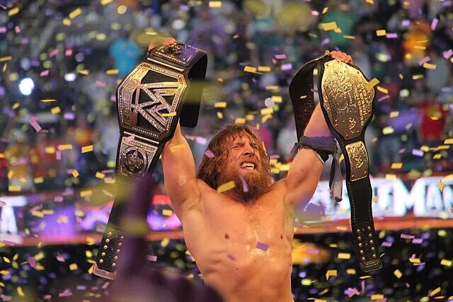 Image of Daniel Bryan at WWE WrestleMania 30 with Championships