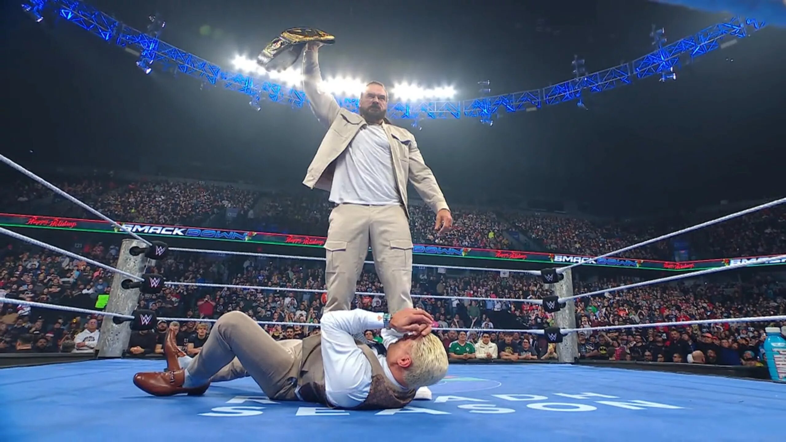 Drew McIntyre posing with thr WWE Undisputed Championship as COdy Rhodes was the Champion