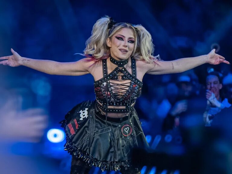 A photo of WWE star Alexa Bliss, the partner of Charlotte Flair.