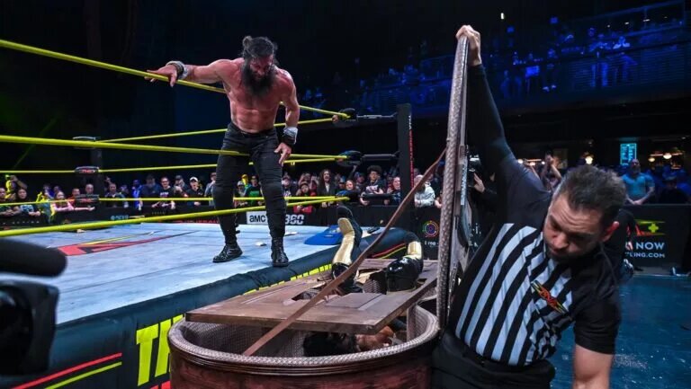 Elijah defeated Mustafa Ami in a Guitar Case Casket match